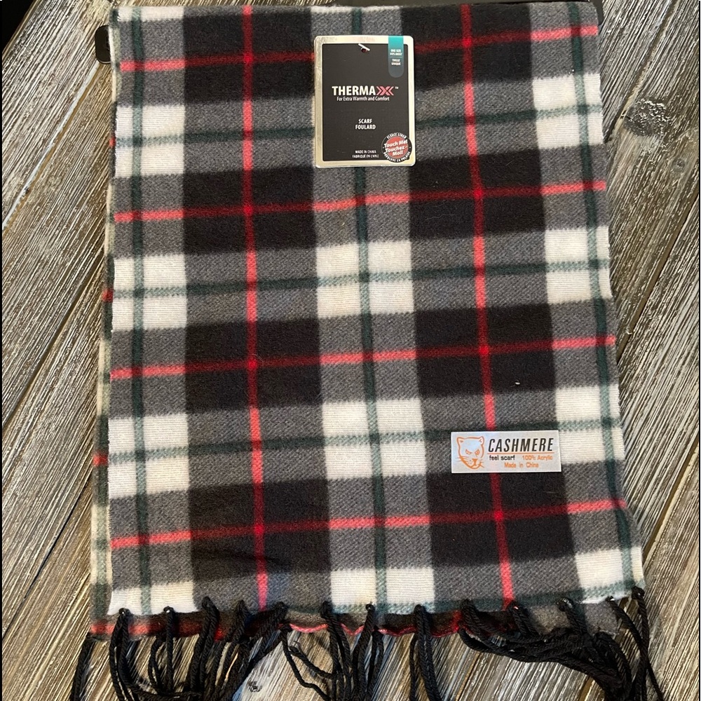 Very cute plaid red, black and white scarf. Some gray and green.